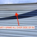 Travel Trailer RV Showing Typical Dirt and Grime on Side of RV