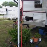 RV awning showing how to tie down for wind resistance